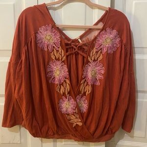 orange flower shirt